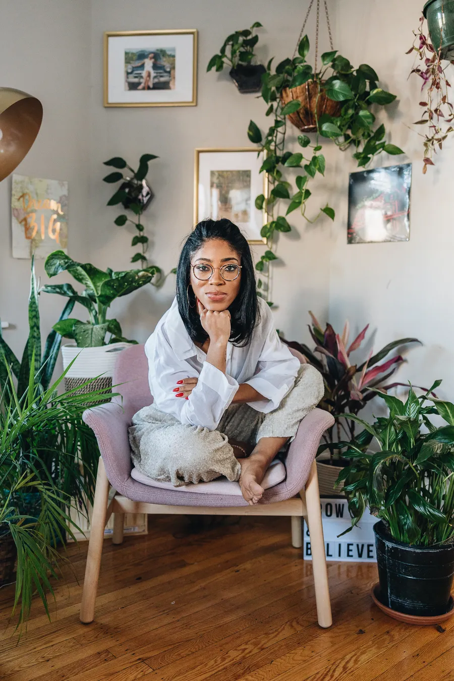 Lauren Miller surrounded by plants, representing the balance of heart and strategy in legacy work