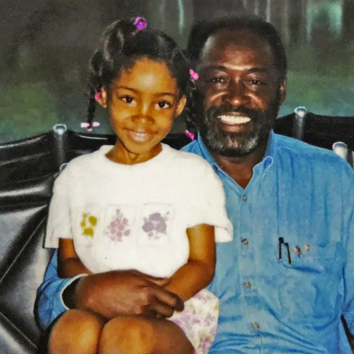 Young Lauren Miller with her father